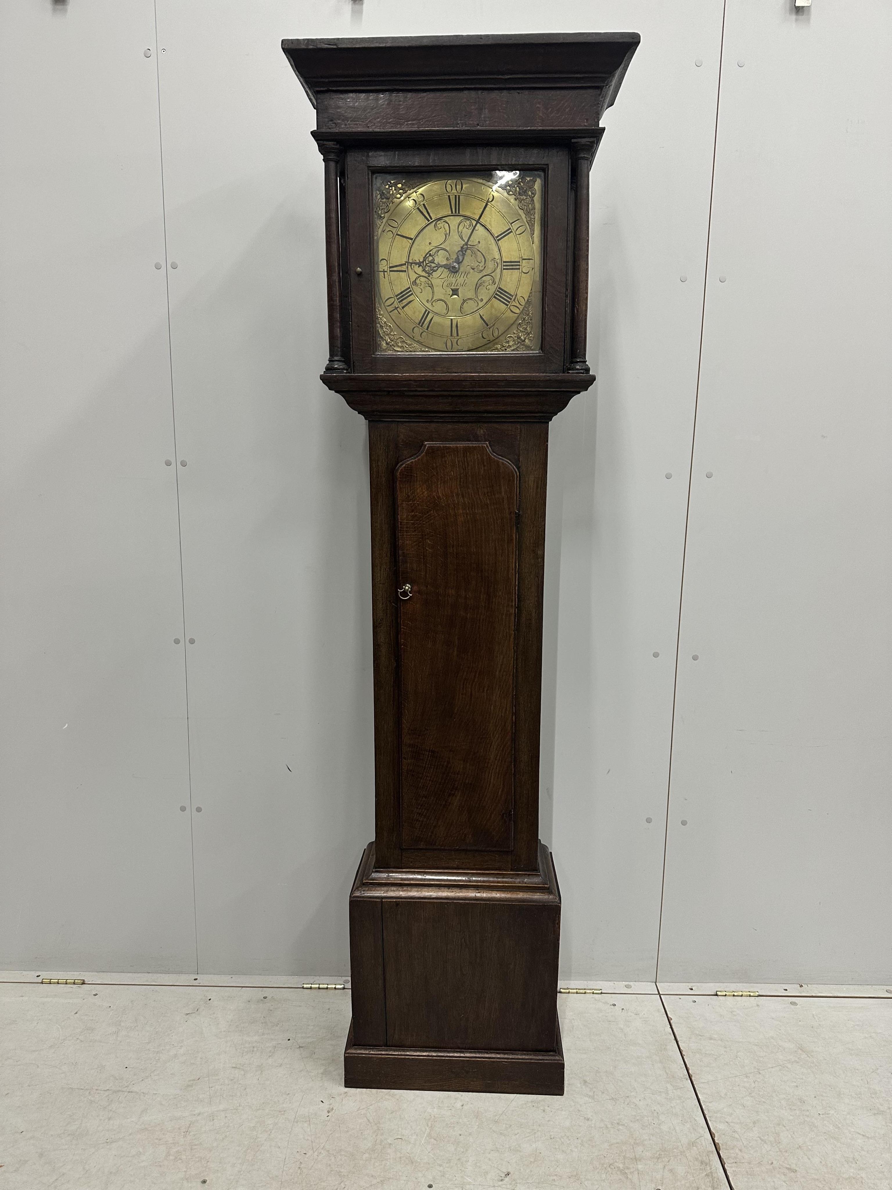 A mid 18th century oak 30 hour longcase clock, the square brass dial marked Lawrie, Carlisle, height 205cm. Condition - poor to fair